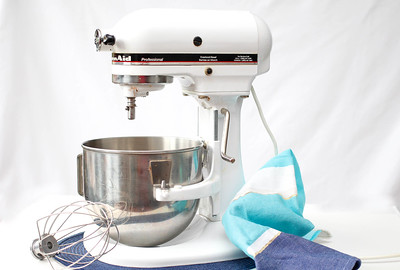 a baking equipment with a bowl and cloth