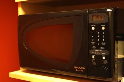 a black kitchen device to cook or heat food
