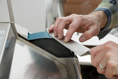 a kitchen tool being polished on an electric device