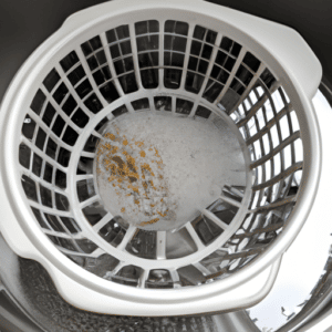 frying basket soaked in soapy water